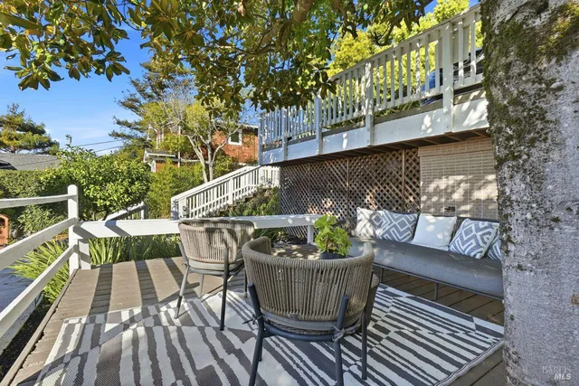 a bedroom with a bed and a lamp