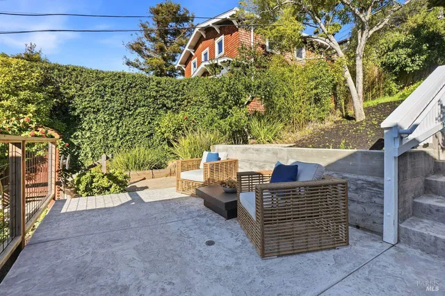 a view of balcony with furniture