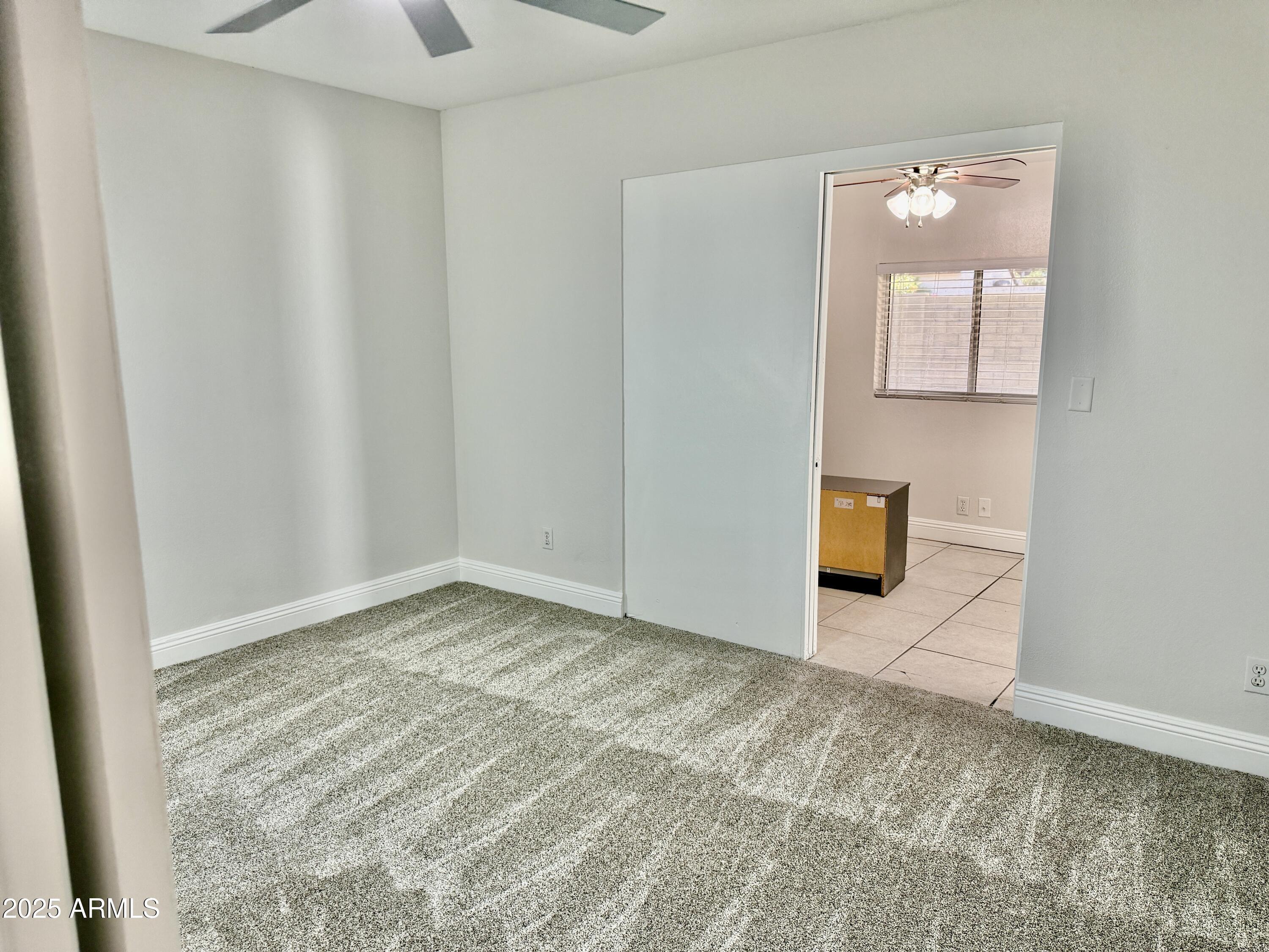 1213 East Tonto Lane Phoenix, AZ 85024 - Photo 14 of 19 a view of an empty room and window