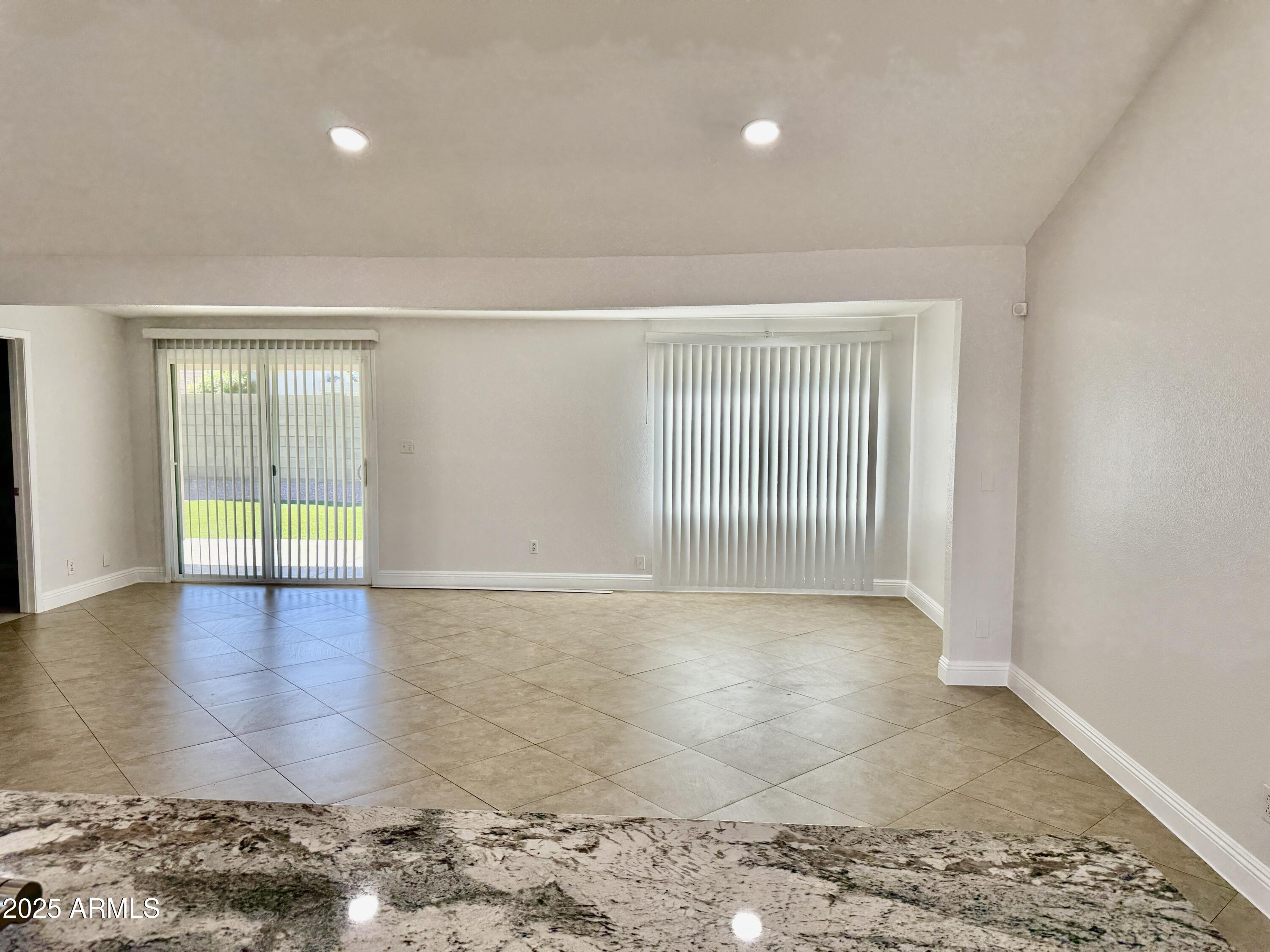 1213 East Tonto Lane Phoenix, AZ 85024 - Photo 6 of 19 a view of an empty room and window