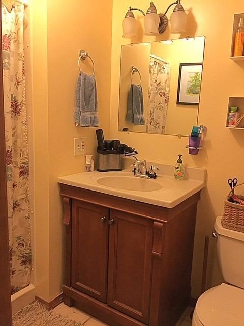 196 Capn Crosby Road Centerville, MA 02632 - Photo 15 of 25 a bathroom with a sink and a mirror