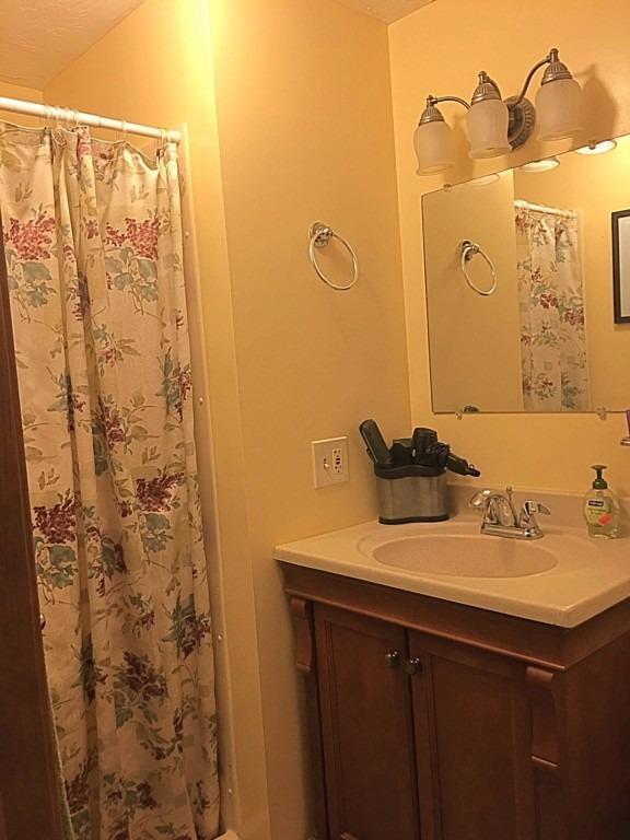 196 Capn Crosby Road Centerville, MA 02632 - Photo 16 of 25 a bathroom with a sink and a mirror