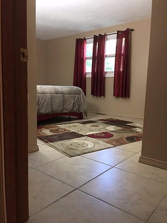 196 Capn Crosby Road Centerville, MA 02632 - Photo 17 of 25 a bedroom with a bed and window