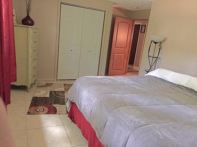 196 Capn Crosby Road Centerville, MA 02632 - Photo 18 of 25 a bedroom with a bed and a mirror