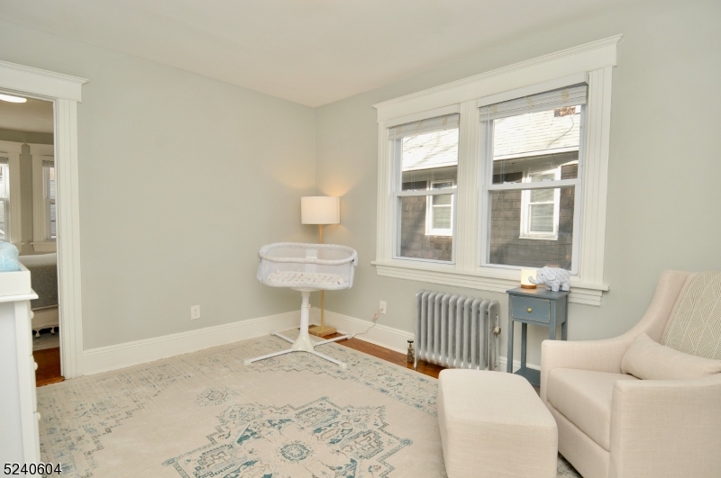 44 Dunnell Road Maplewood, NJ 07040 - Photo 11 of 17 a view of a livingroom with furniture and windows