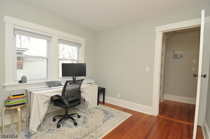 44 Dunnell Road Maplewood, NJ 07040 - Photo 13 of 17 a view of a workspace with furniture and a window