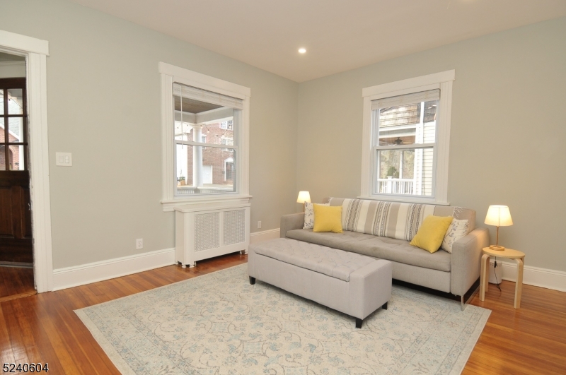 44 Dunnell Road Maplewood, NJ 07040 - Photo 4 of 17 a living room with furniture and a window