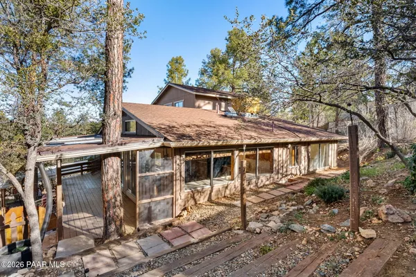 a house with trees in front of it