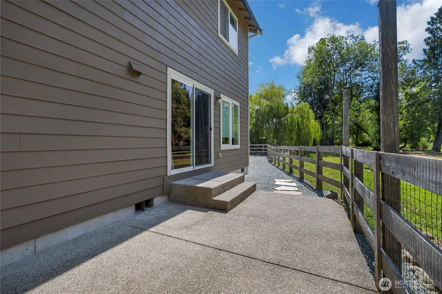 a view of a balcony with chairs