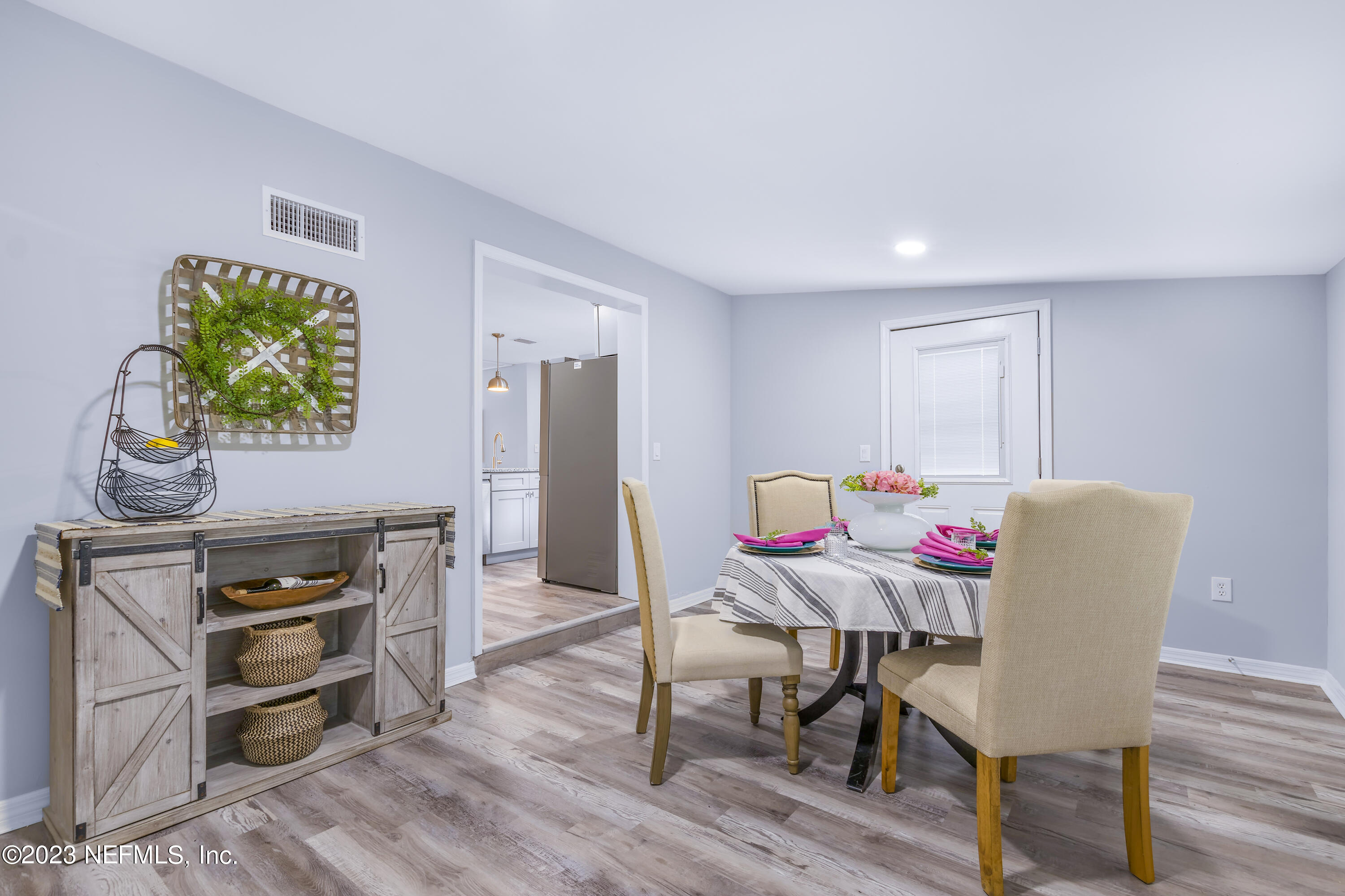 295 Edson Drive Orange Park, FL 32073 - Photo 12 of 37 a dining room with furniture and window