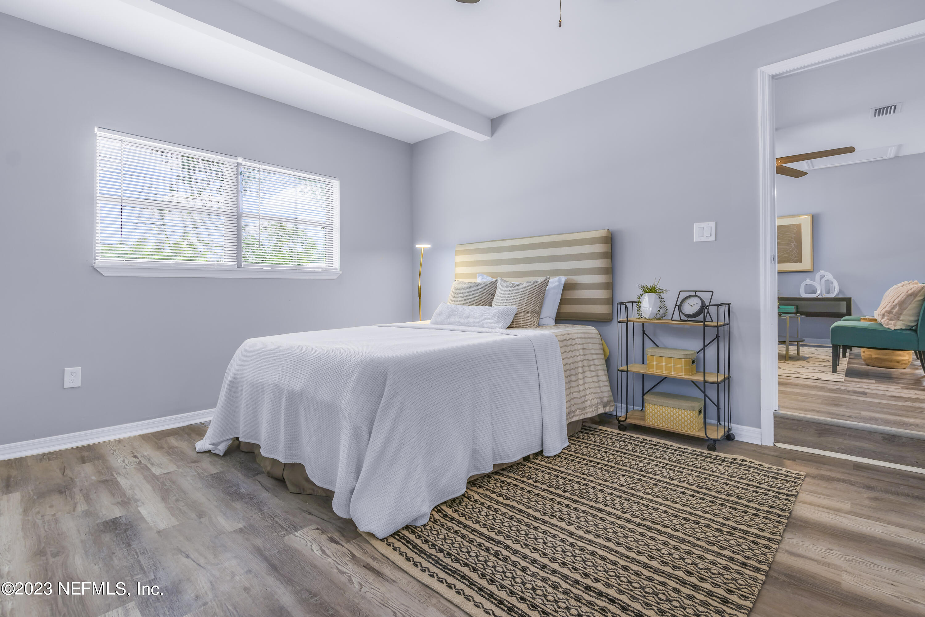 295 Edson Drive Orange Park, FL 32073 - Photo 15 of 37 a bedroom with a bed and a window