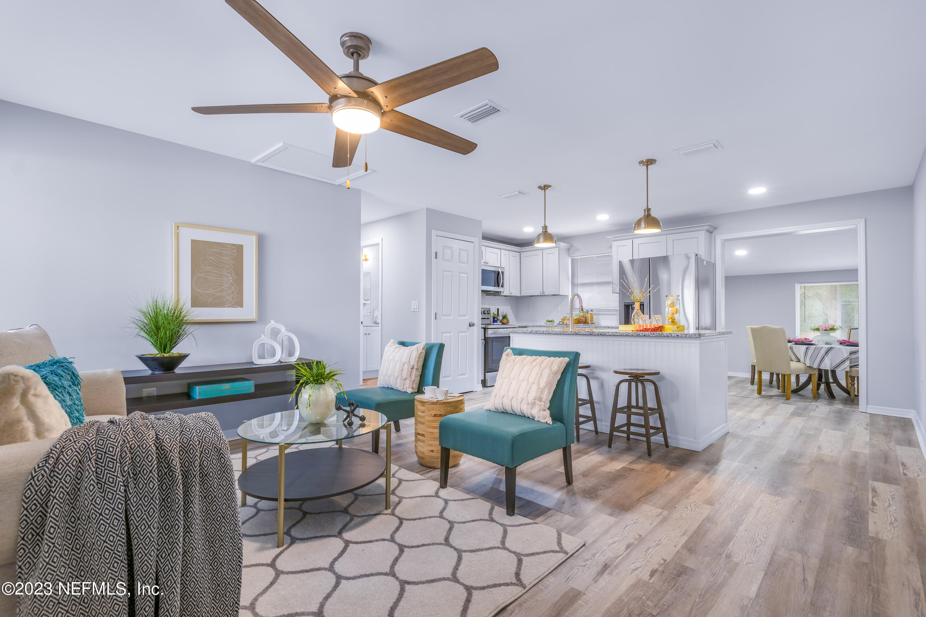295 Edson Drive Orange Park, FL 32073 - Photo 2 of 37 a living room with furniture and kitchen view