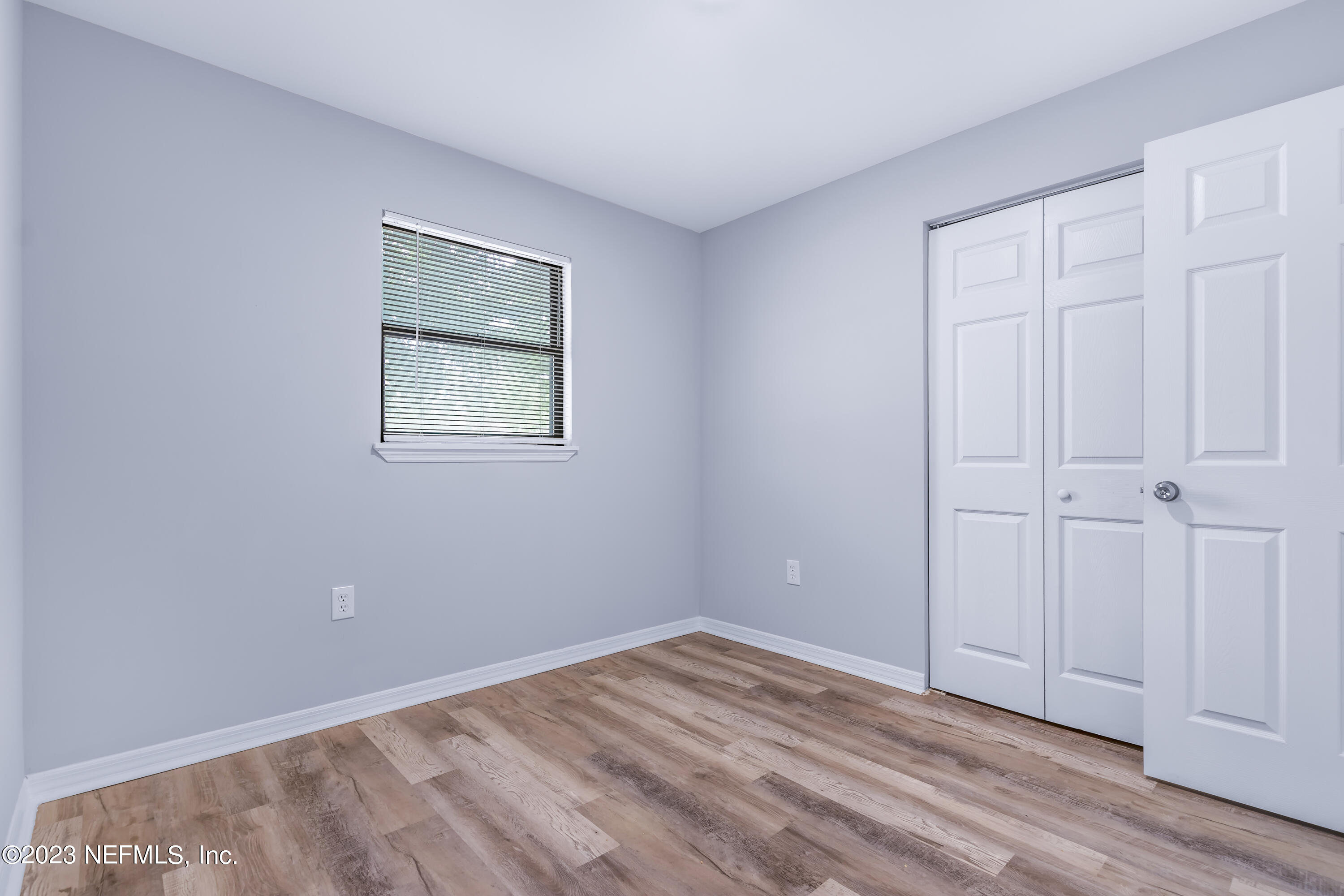295 Edson Drive Orange Park, FL 32073 - Photo 27 of 37 wooden floor in an empty room
