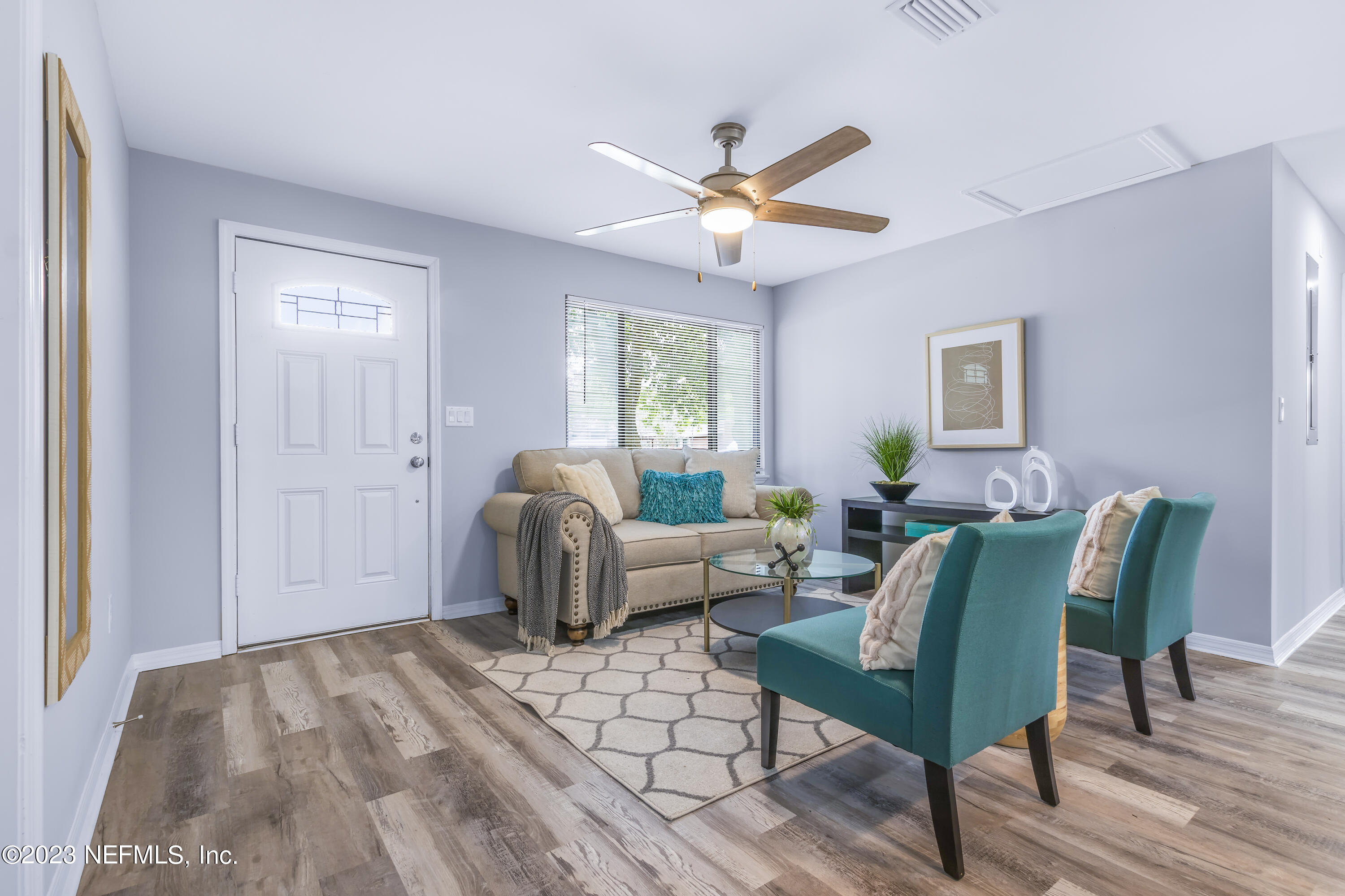 295 Edson Drive Orange Park, FL 32073 - Photo 29 of 37 a living room with furniture and a window