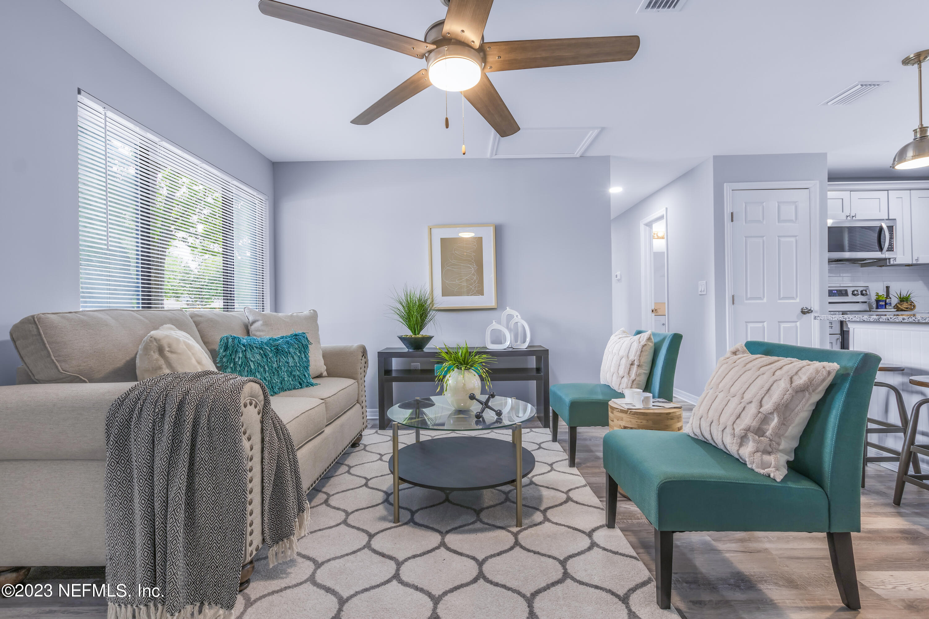 295 Edson Drive Orange Park, FL 32073 - Photo 4 of 37 a living room with furniture and a large window