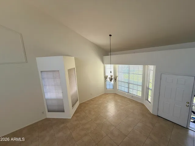 a kitchen with granite countertop stainless steel appliances and wooden cabinets