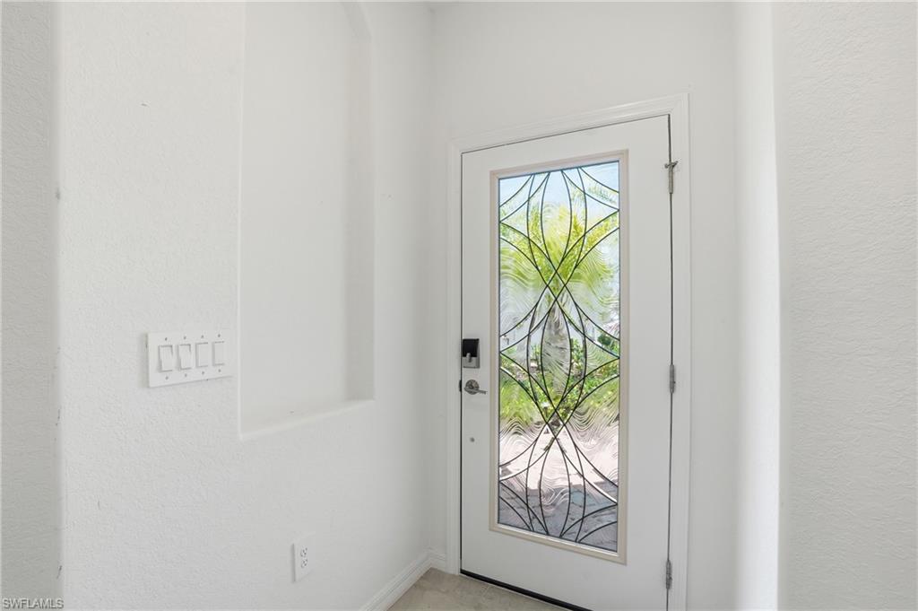 2215 Dragonfruit Way Naples, FL 34120 - Photo 5 of 38 a view of a front door