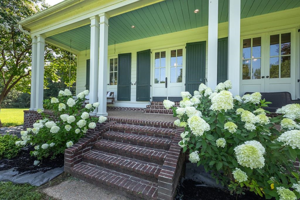1915 Teague Store Road Somerville, TN 38068 - Photo 3 of 38 Brick staircase leading to an inviting covered porch