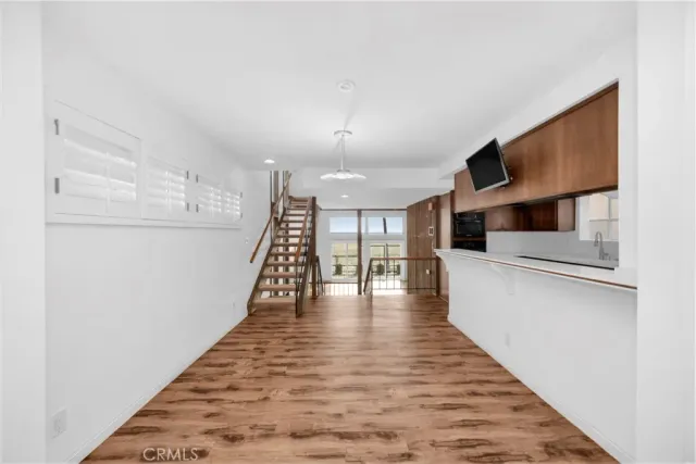 a kitchen with a sink and a microwave