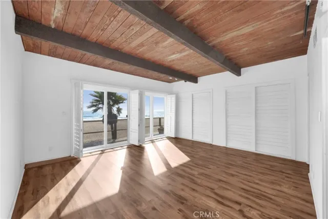 front view of a house with a large window