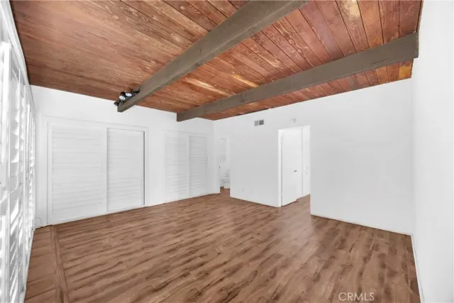 a bathroom with a sink toilet vanity and mirror
