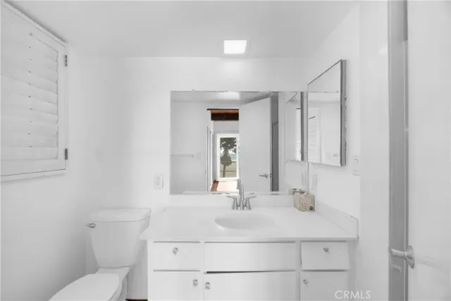 a bathroom with a sink and a vanity
