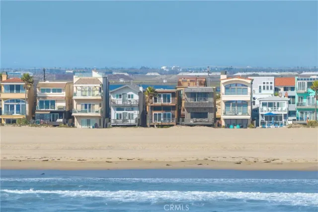 a view of city from balcony with seating space