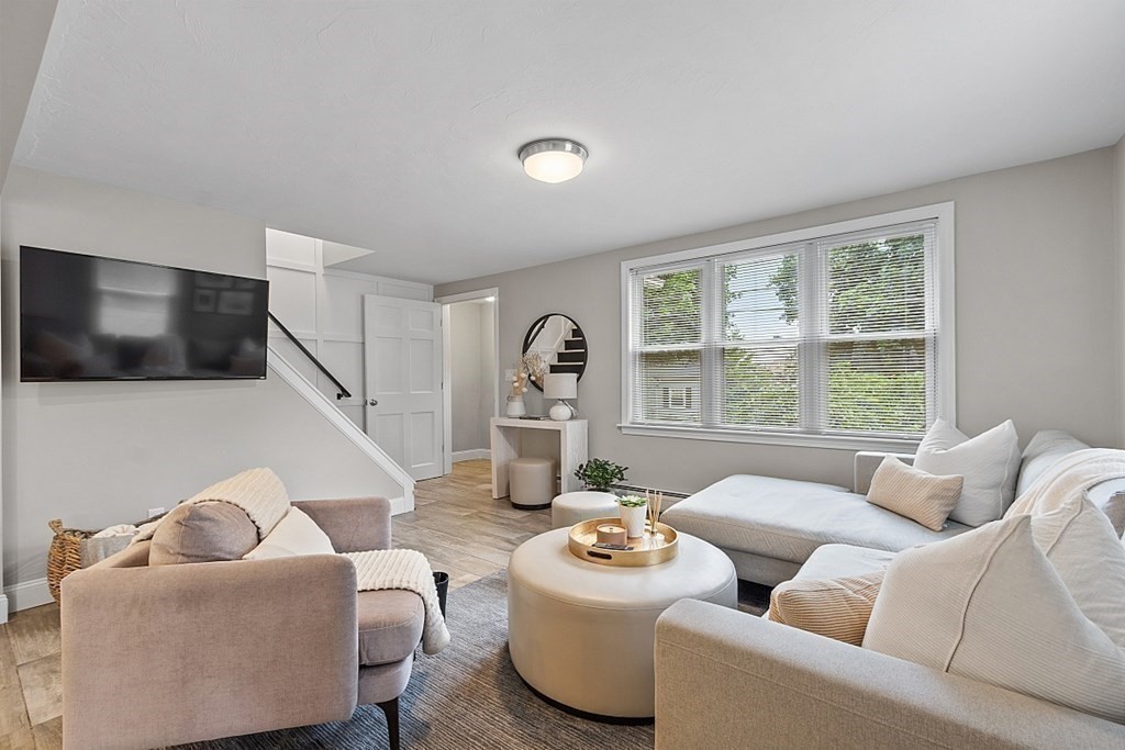 42 Ancona Road Worcester, MA 01604 - Photo 18 of 38 a living room with furniture and a flat screen tv