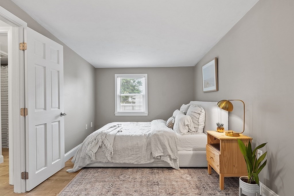 42 Ancona Road Worcester, MA 01604 - Photo 27 of 38 a bedroom with a bed and window