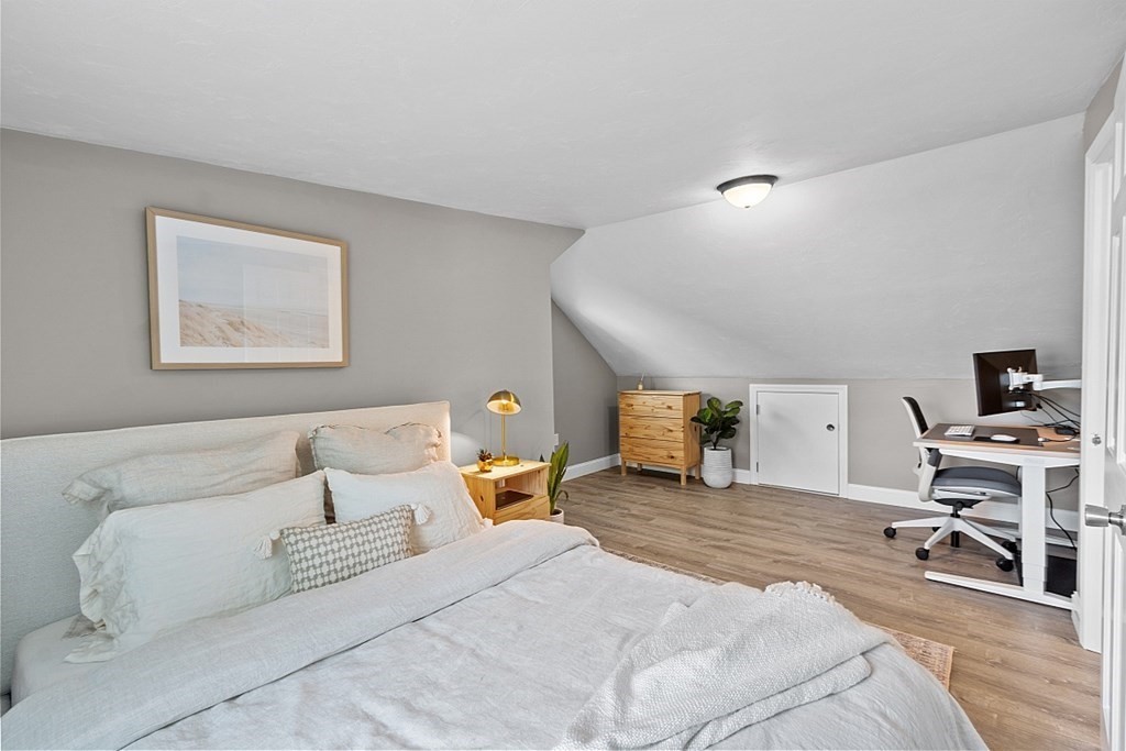 42 Ancona Road Worcester, MA 01604 - Photo 28 of 38 a bedroom with a bed and a desk