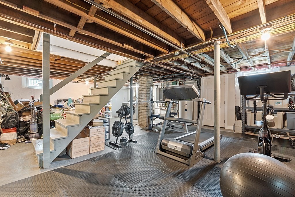 42 Ancona Road Worcester, MA 01604 - Photo 30 of 38 a living room with lots of furniture and a chandelier