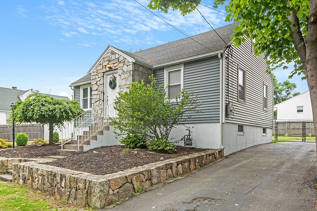 42 Ancona Road Worcester, MA 01604 - Photo 3 of 38 a front view of a house with garden