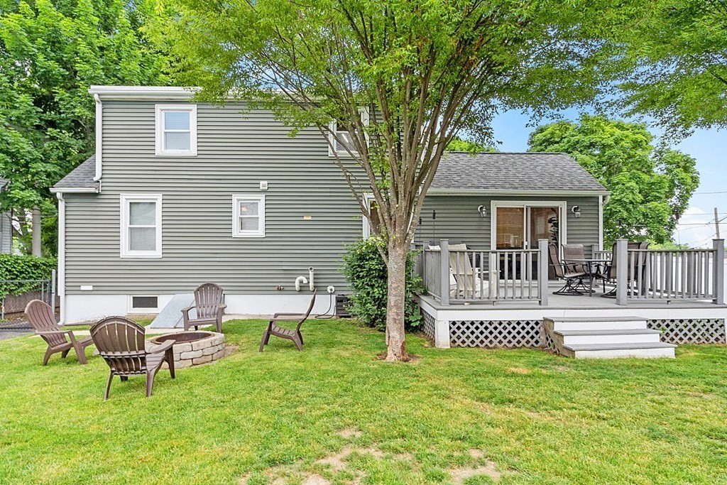 42 Ancona Road Worcester, MA 01604 - Photo 5 of 38 a front view of a house with a yard
