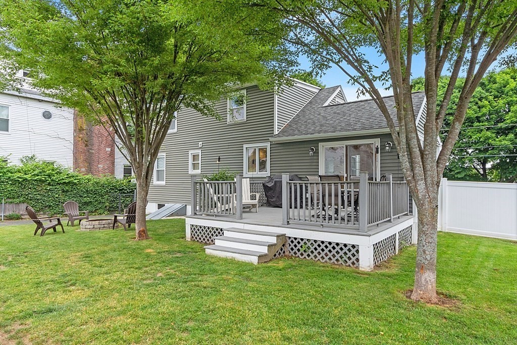 42 Ancona Road Worcester, MA 01604 - Photo 6 of 38 a view of a house with a yard and deck