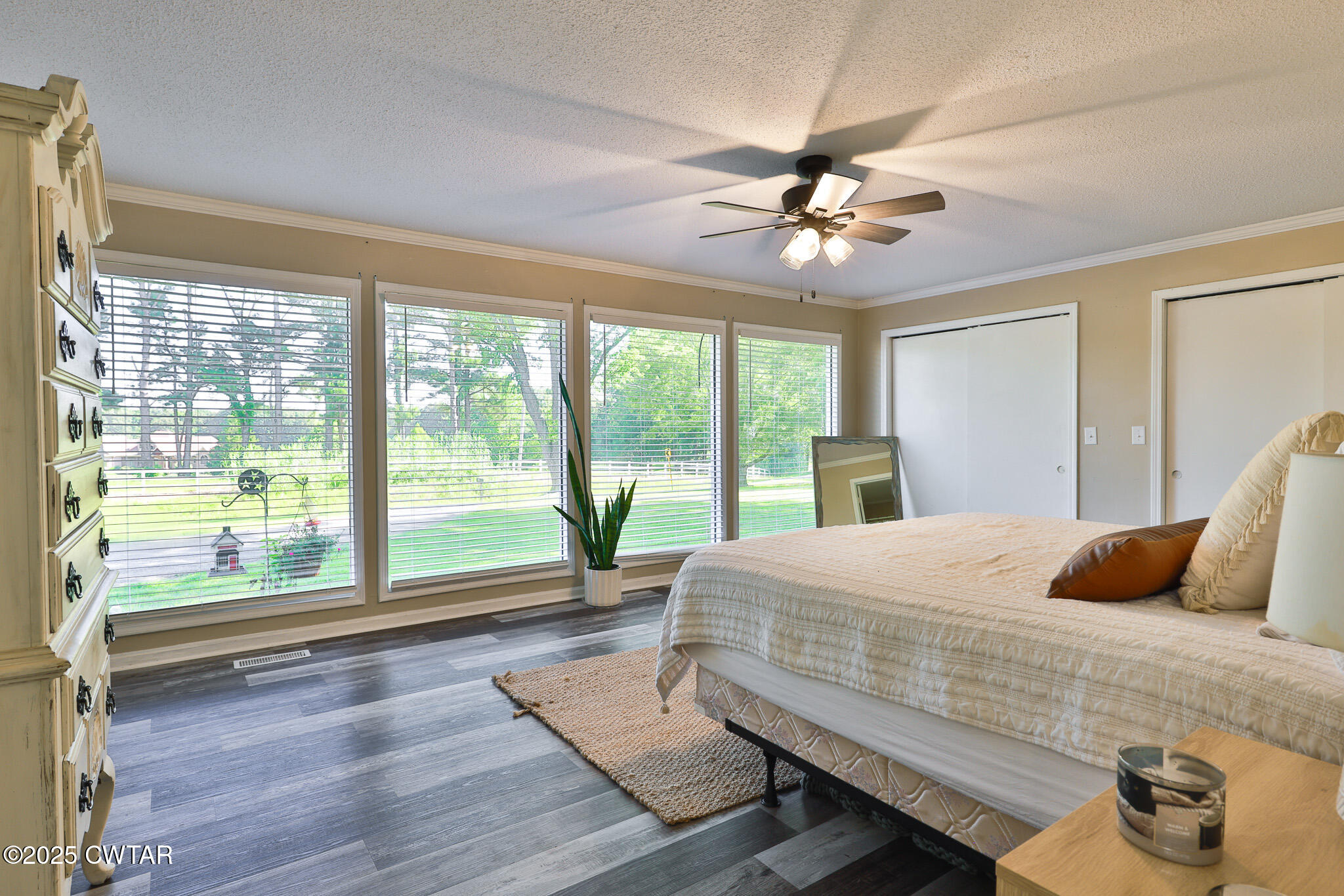 1968 Ralston Road Martin, TN 38237 - Photo 14 of 54 a bedroom with a large bed and a large window