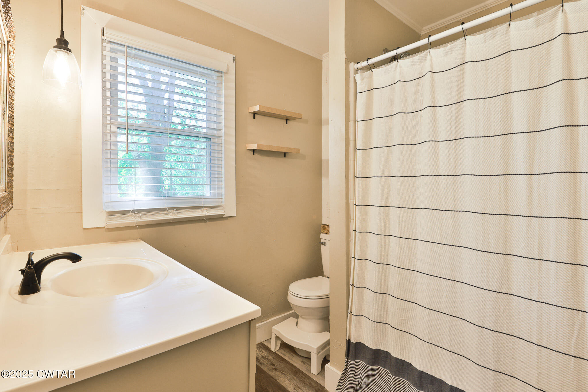 1968 Ralston Road Martin, TN 38237 - Photo 15 of 54 a bathroom with a sink toilet and shower
