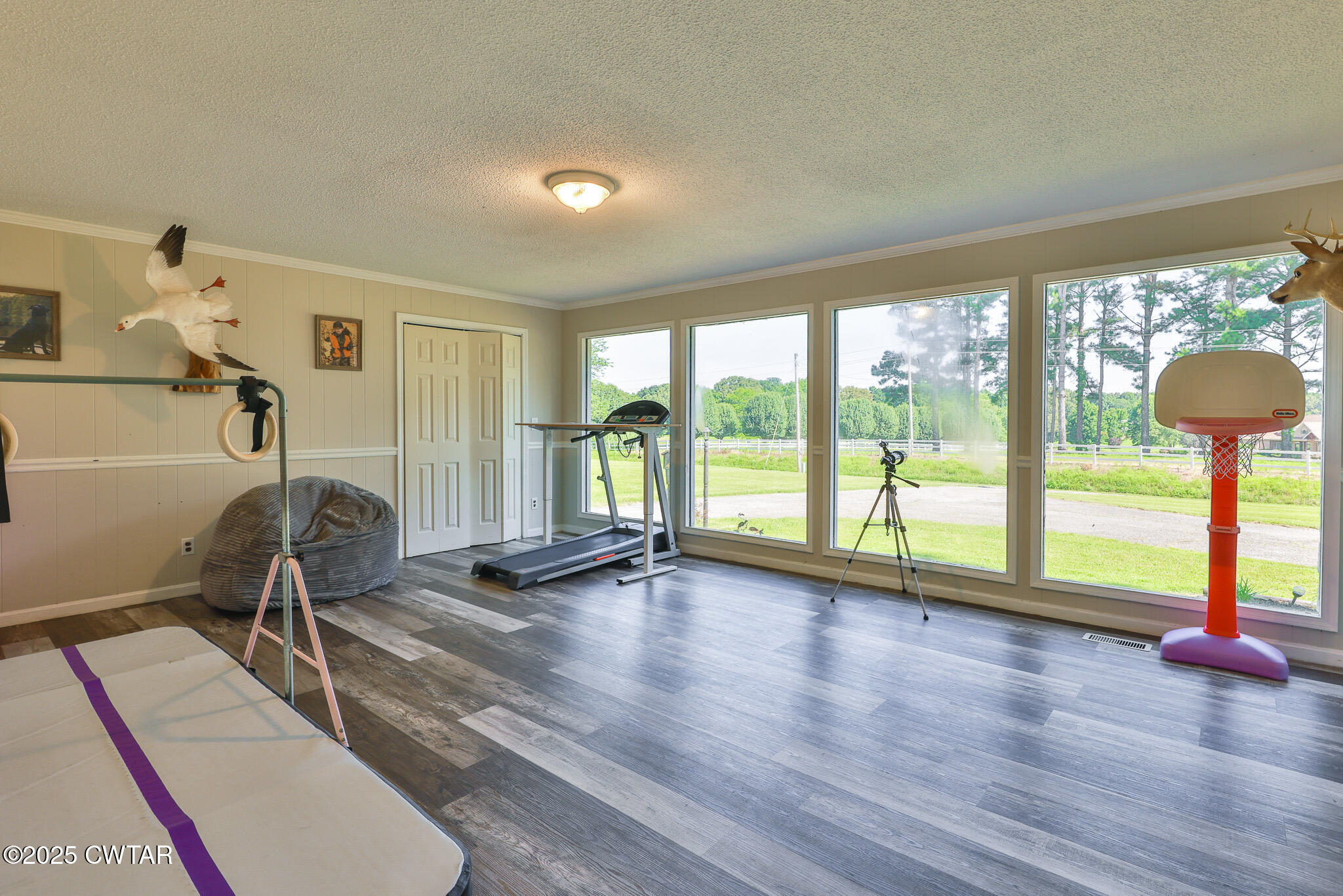 1968 Ralston Road Martin, TN 38237 - Photo 16 of 54 a room with gym equipment and a large window
