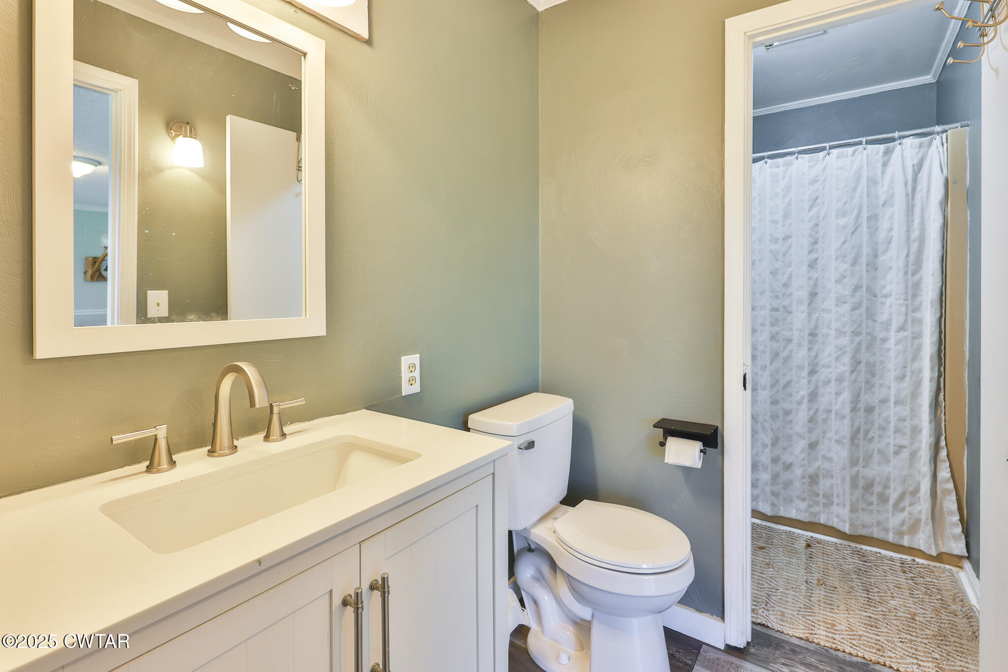 1968 Ralston Road Martin, TN 38237 - Photo 20 of 54 a bathroom with a sink toilet and a mirror