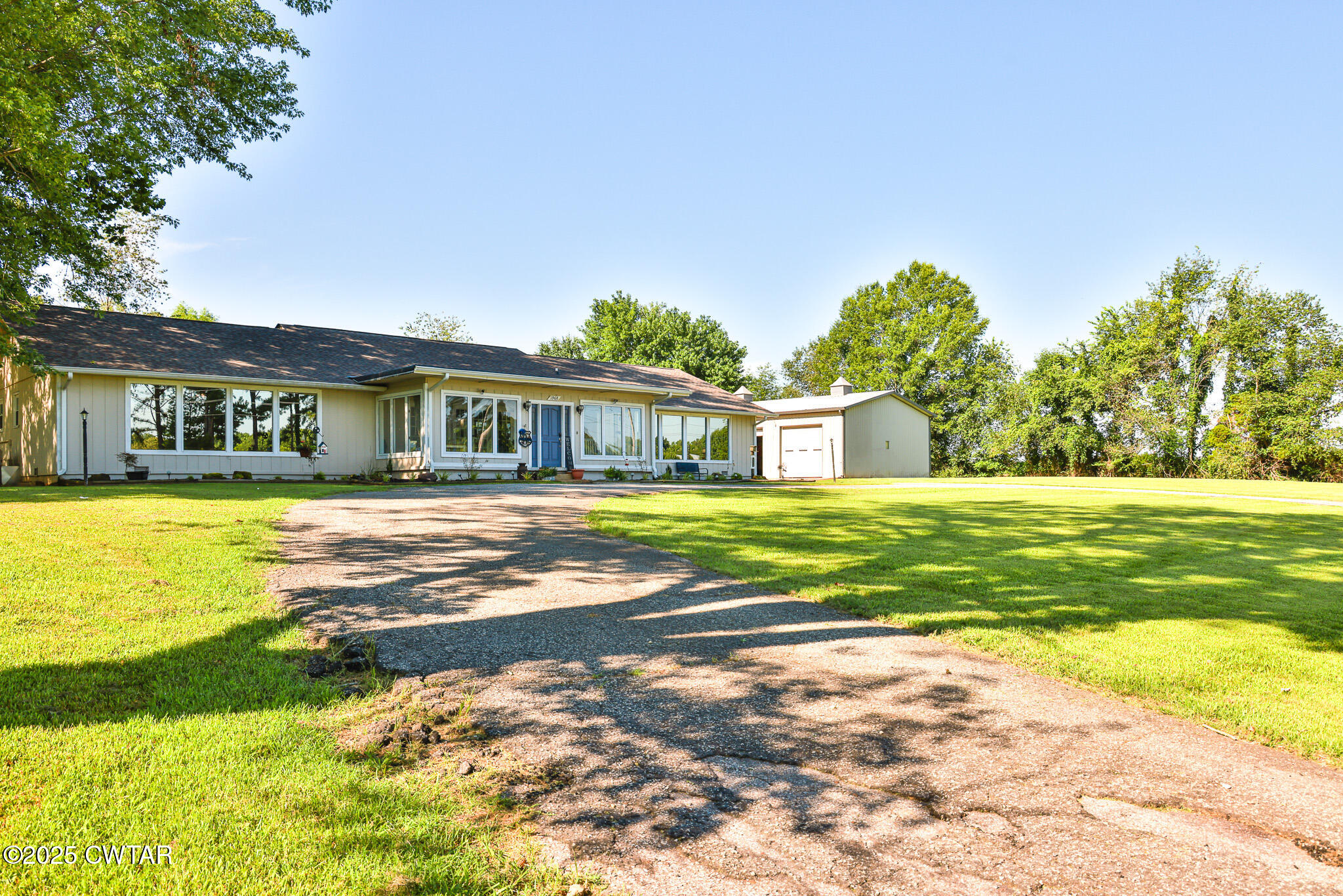 1968 Ralston Road Martin, TN 38237 - Photo 25 of 54 a view of house with a big yard