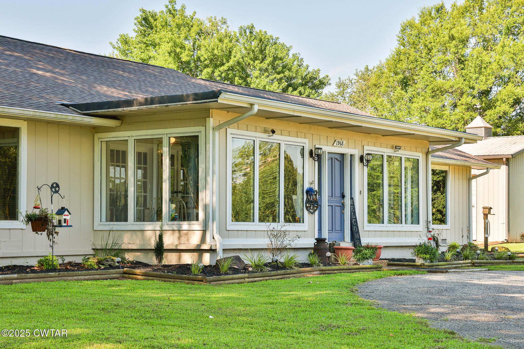 1968 Ralston Road Martin, TN 38237 - Photo 29 of 54 a front view of a house with a yard