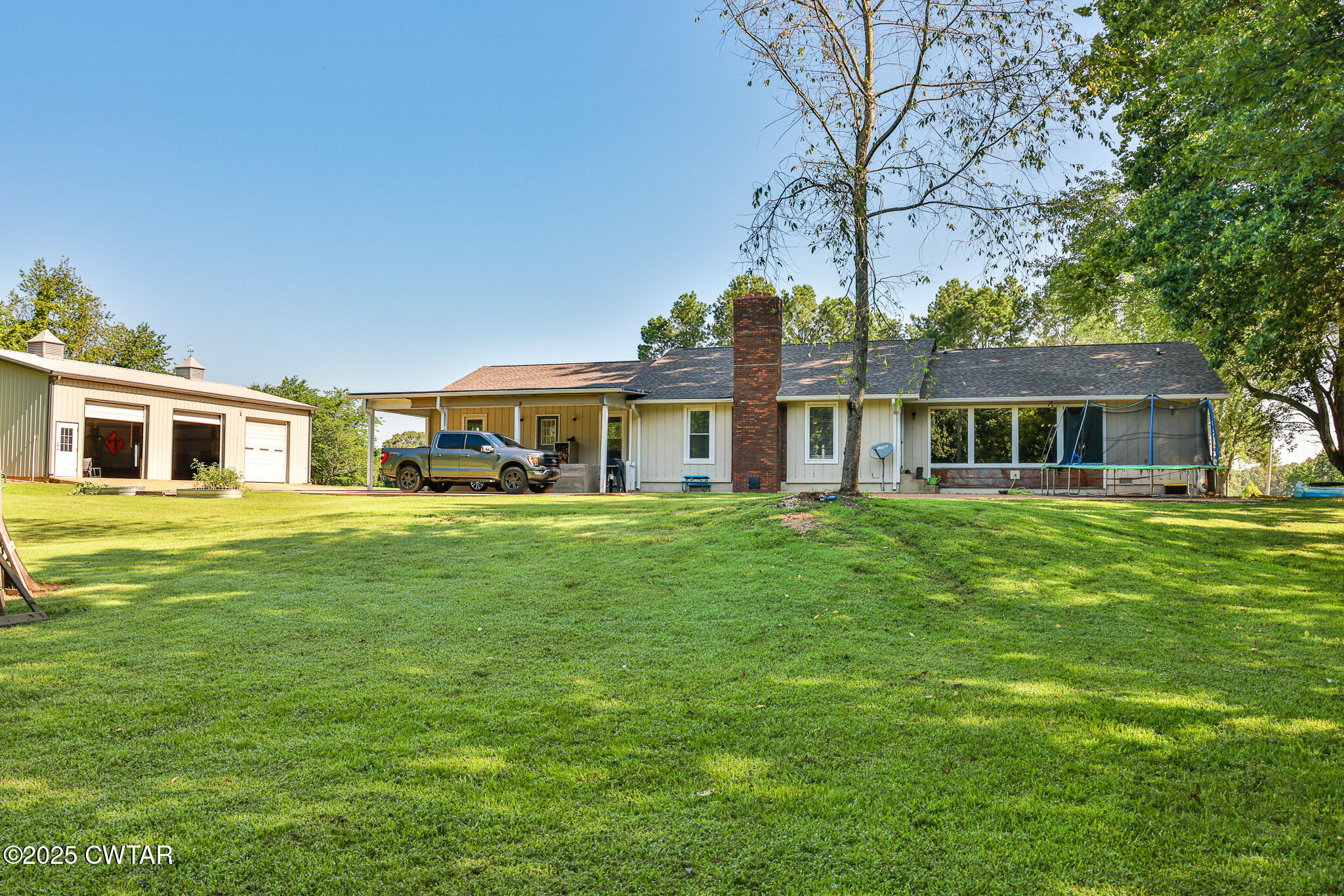 1968 Ralston Road Martin, TN 38237 - Photo 31 of 54 a front view of a house with a garden
