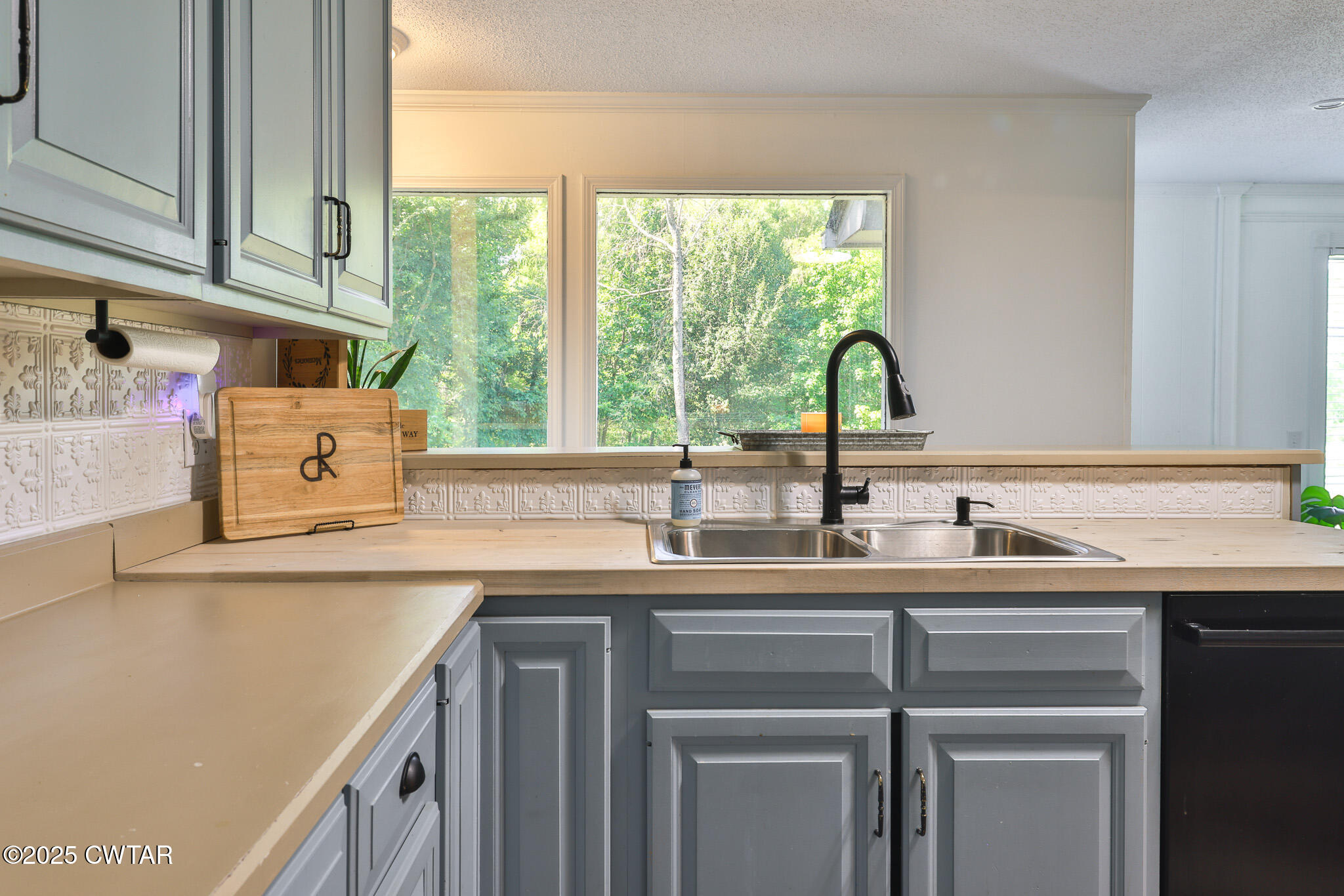 1968 Ralston Road Martin, TN 38237 - Photo 6 of 54 a kitchen with a sink a counter and a window