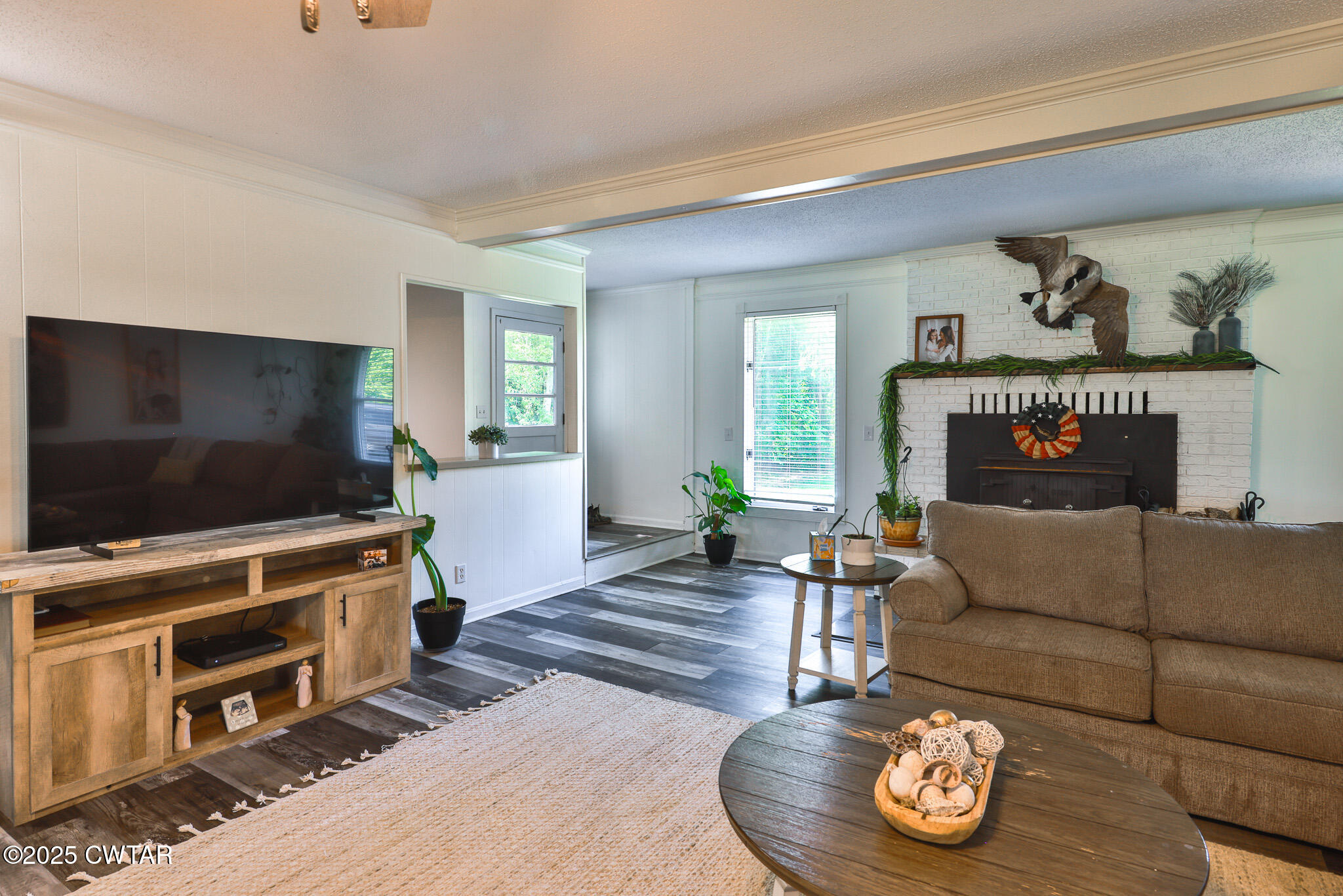 1968 Ralston Road Martin, TN 38237 - Photo 9 of 54 a living room with furniture and a flat screen tv