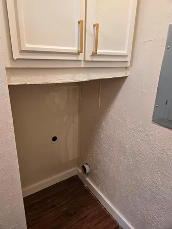 a view of wooden floor with a window