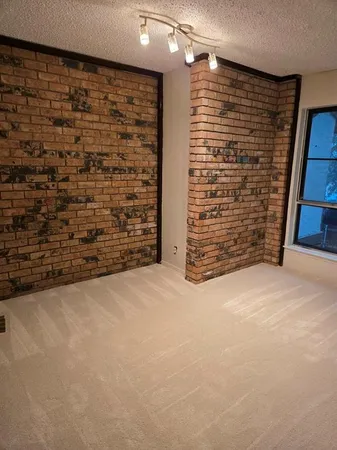 wooden floor and window in an empty room