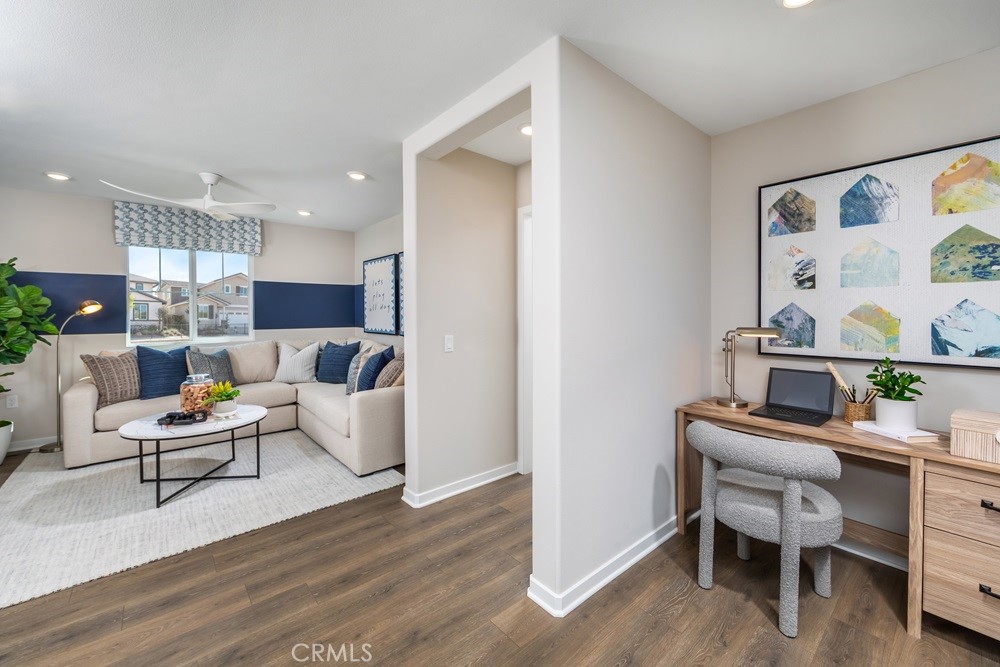 9573 Glenmore Frst Drive Riverside, CA 92508 - Photo 11 of 11 a living room with furniture and a wooden floor