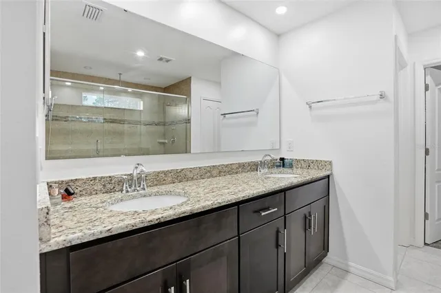 a living room with furniture gym equipment and a flat screen tv