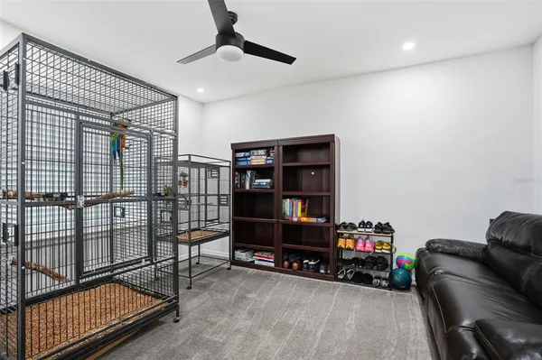 a view of staircase with wooden floor and a window