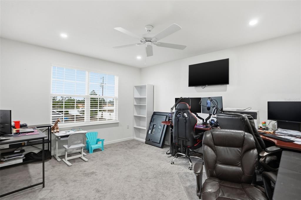 13286 Pendleton Street Spring Hill, FL 34609 - Photo 30 of 57 a view of a livingroom with workspace and a window