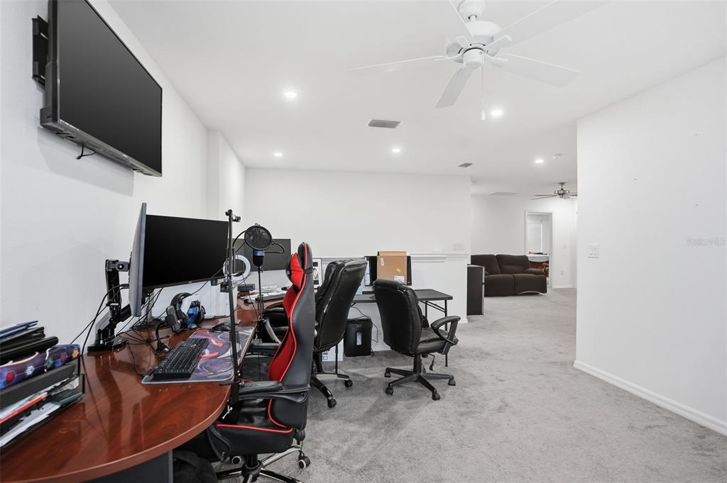 13286 Pendleton Street Spring Hill, FL 34609 - Photo 31 of 57 a view of a room with gym equipment